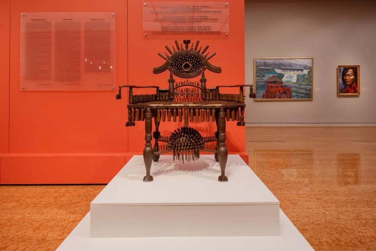   The Dormant Chamber:  Gonçalo Mabunda subverts the function of lethal armaments sourced from Mozambique's TAE project by transforming them into a regal throne. This object is a Thanatopolitical artifact, where the Fissure is the legal and material gray zone of the silenced gun, embodying the weaponization of material. 