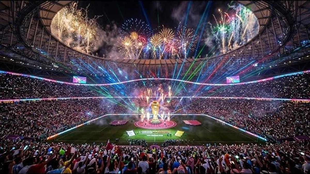 The raw scale of the digital spectacle: opening ceremonies and stadium infrastructure during the global football tournament serve as the ambient, hyper-visible backdrop against which a single anonymous spectator constructed an inversion of contemporary celebrity culture.
