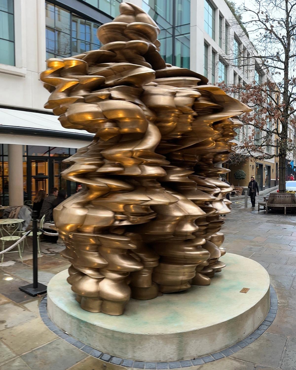 Tony Cragg sculpture in Ham Yard, London, an organic stacked bronze form from his sustained material investigations.