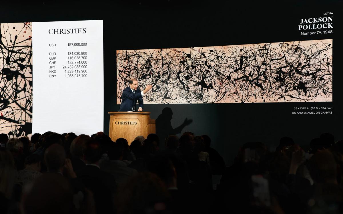  The theater of blue-chip inevitability: Jackson Pollock’s  Number 7A, 1948  on the digital rostrum at Christie’s New York, where the machinery of the auction house converts modernist historical rupture into highly liquid, pre-secured capital. 
