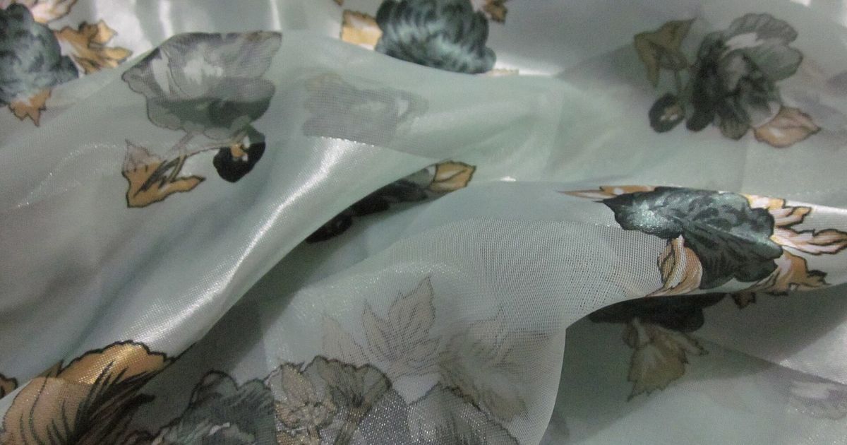 A patterned silk scarf, the ninety-centimetre twill format whose making this study prices.