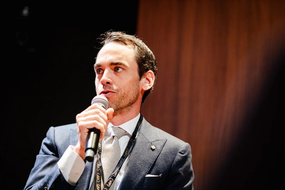  Edouard Meylan of H Moser & Cie and the Genesis Project speaking at the APA Summit Paris 2026 Panel. Photo credit to the American Phygital Association. 