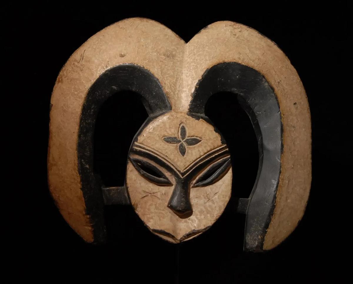 The Sacred Intermediary: A Kwele Ekuk mask. Its