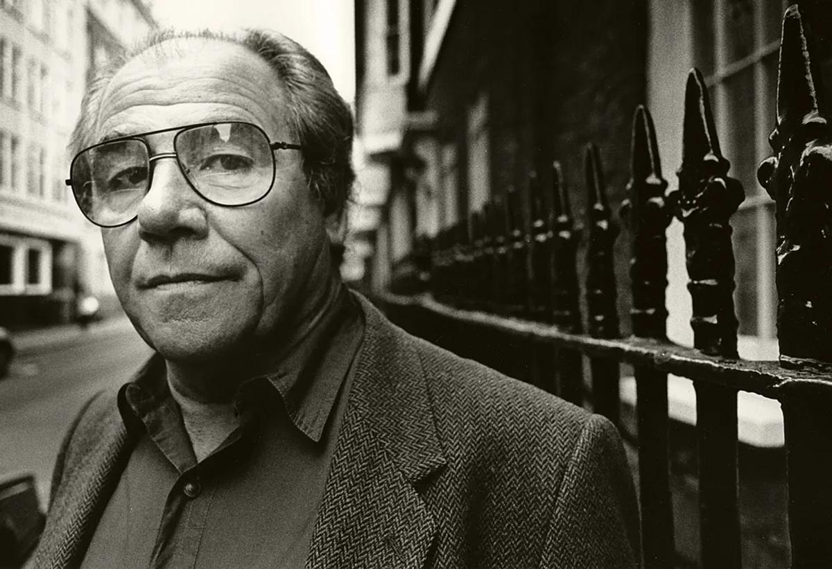  French philosopher Jean Baudrillard, whose theories on hyperreality provide a critical lens through which to understand the luxury industry's construction of a consumer landscape where the sign replaces the real. 