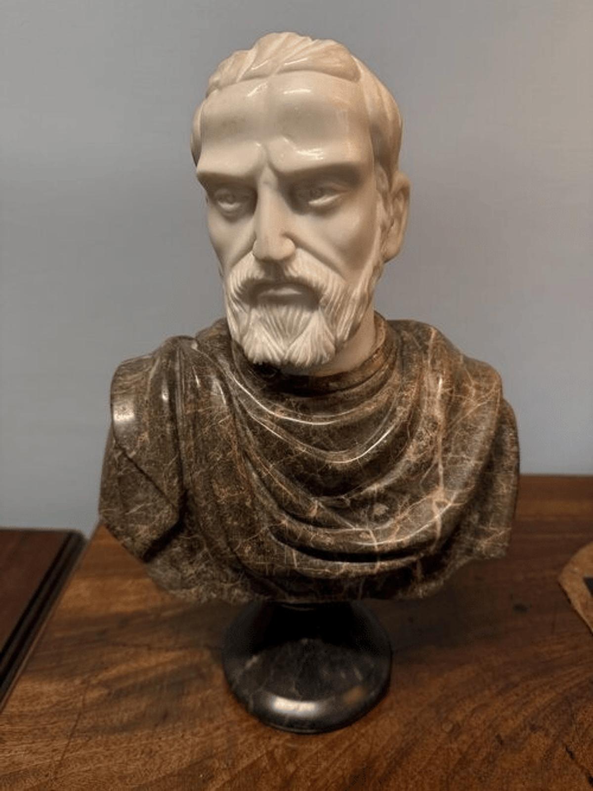  The foundational critique: A marble bust of Plato, whose 
