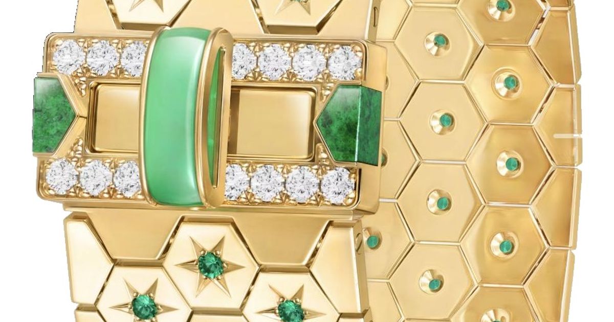 A wide gold honeycomb mesh bracelet with a buckle set with diamonds, a pale green bar and two mottled green cabochons.