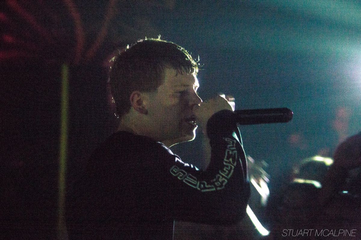 Yung Lean performing live at a 2014 concert, stage photograph