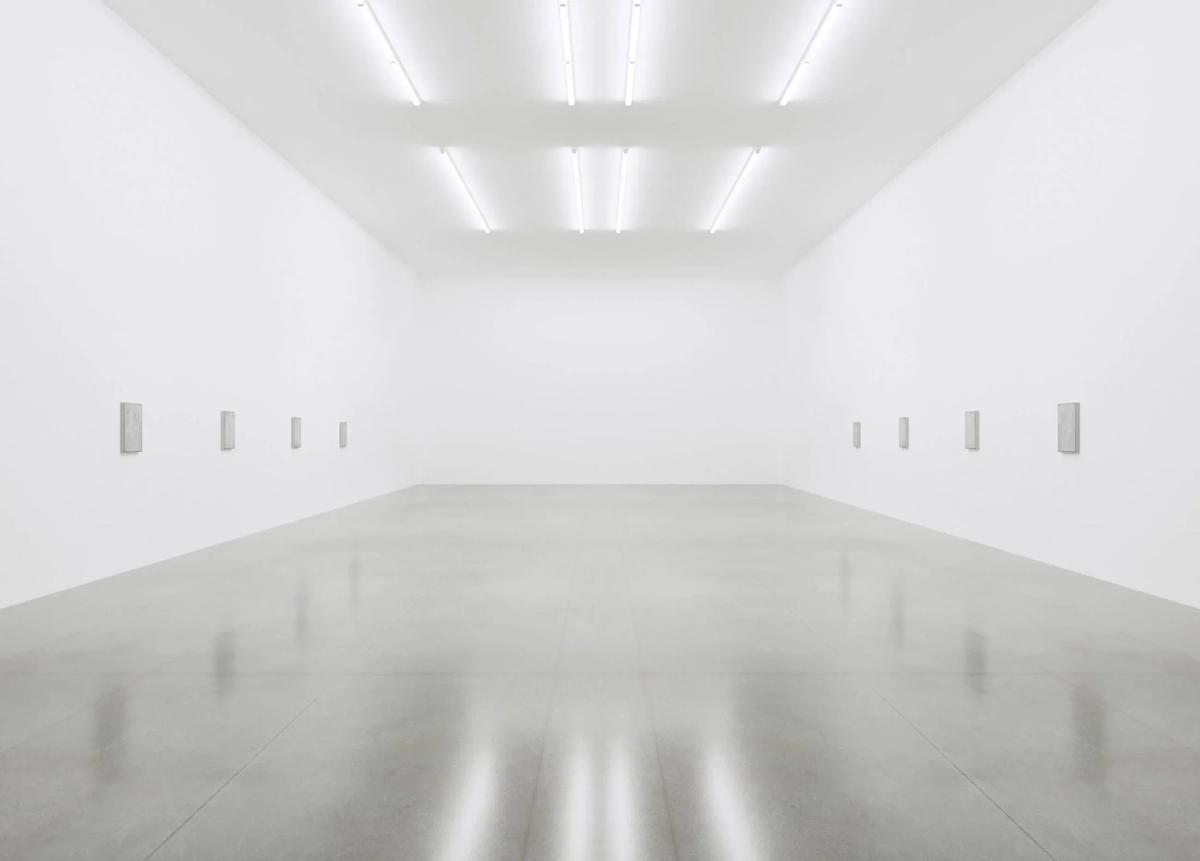 The Myth of Neutrality: The White Cube is not a passive backdrop; it is an aggressive aesthetic technology designed to suspend time and exclude the outside world, creating a carefully constructed illusion of sanctity referenced in O'Doherty's seminal text.