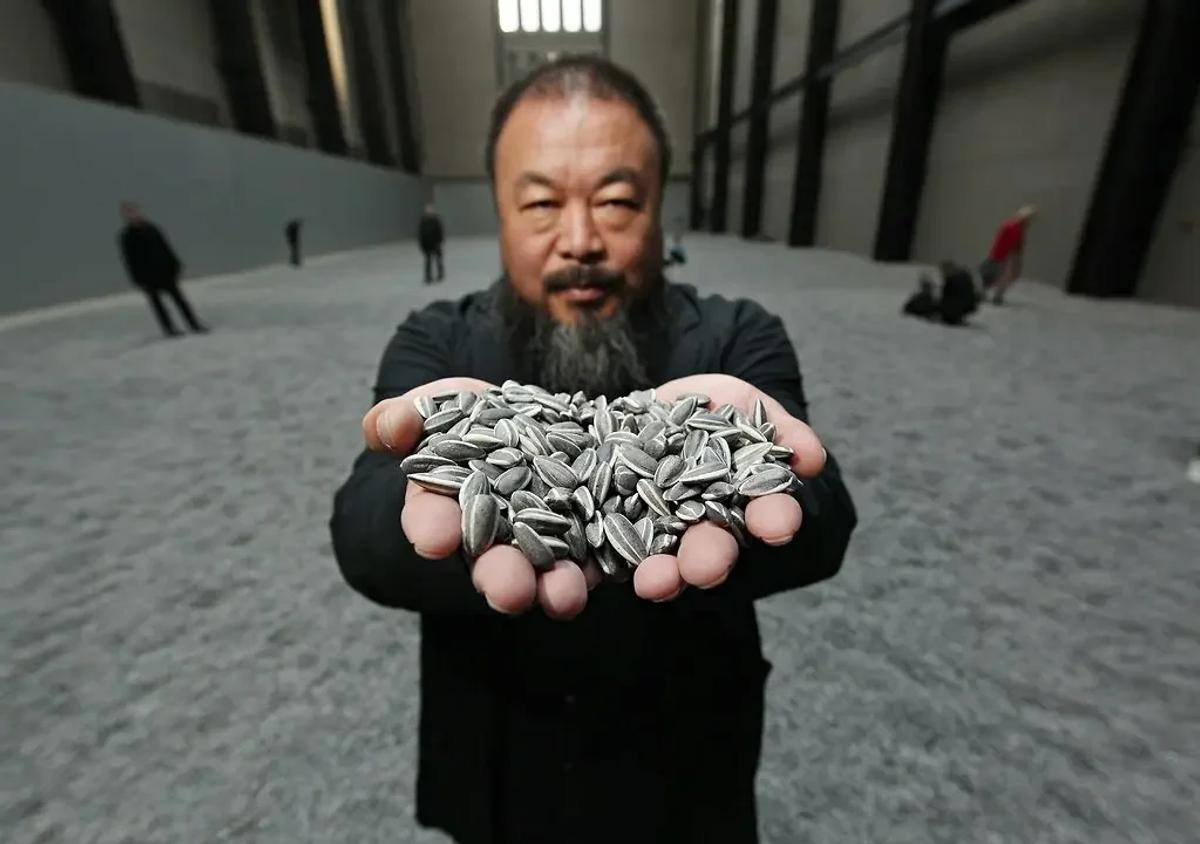 Activism as medium: Ai Weiwei's 'Sunflower Seeds' at the Tate Modern, composed of millions of individually handcrafted porcelain seeds, serves as a powerful political commentary on mass production, collective labor, and the individual's place in society. 