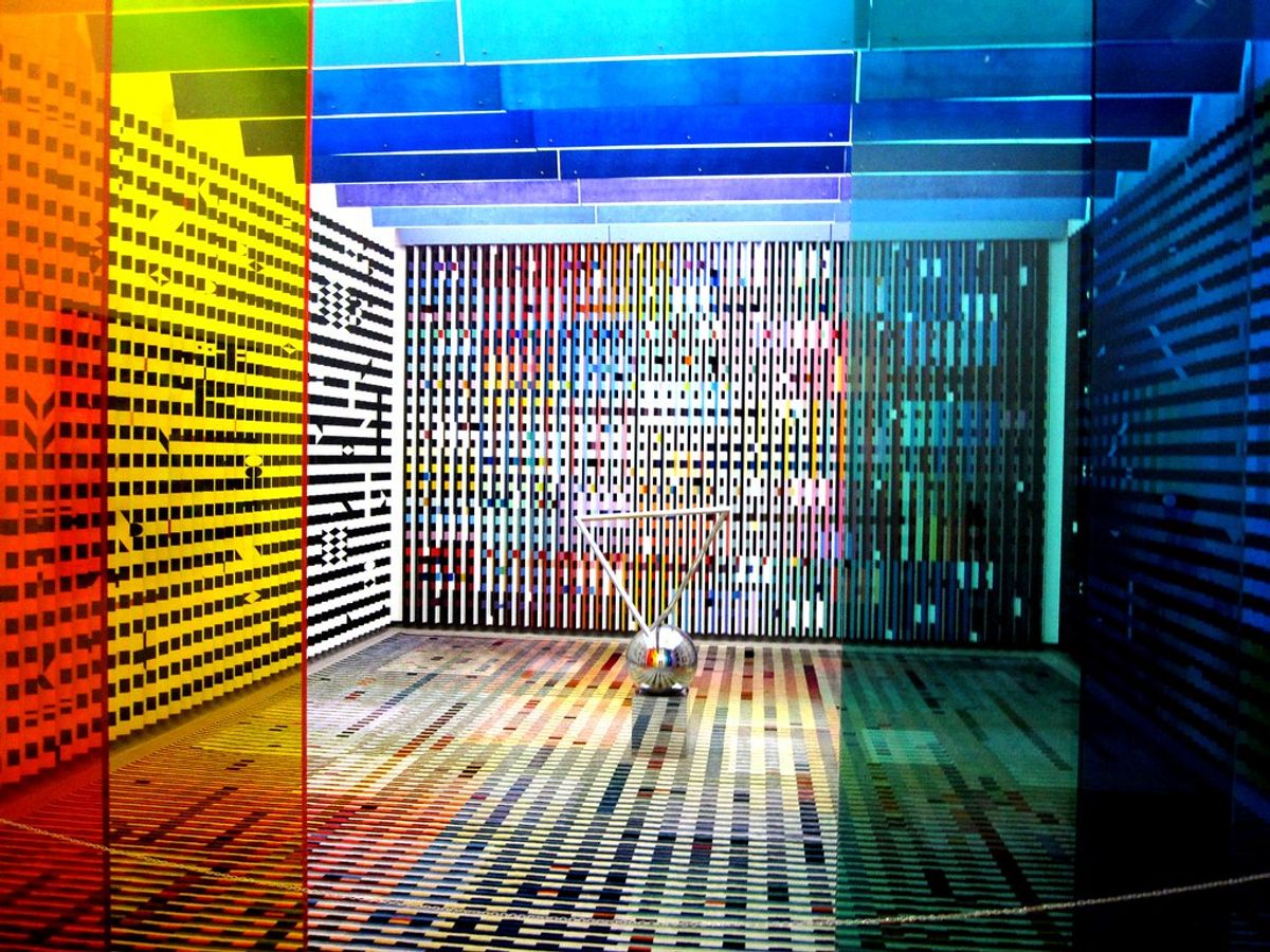 Agam's kinetic interior installation designed for the private apartments of President Georges Pompidou at the Elysee Palace, Paris, featuring shifting colored panels and dynamic walls