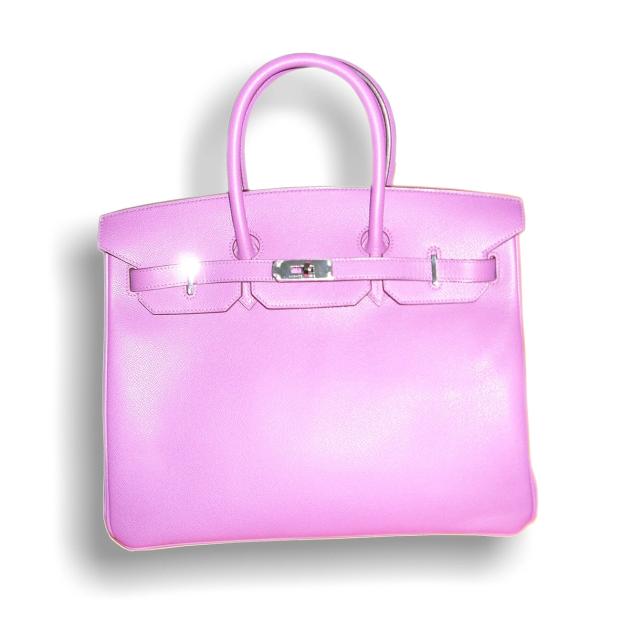 A pink leather Hermes Birkin bag photographed against a plain white background, its rolled handles upright and the lock and straps closed across the front.