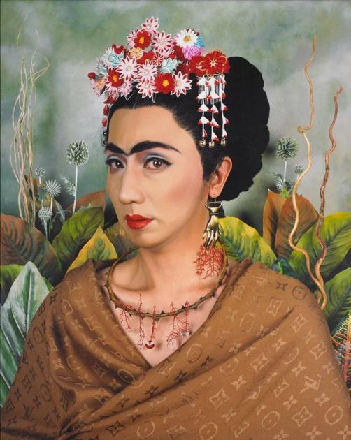 A painting of a figure with red and white flowers pinned into braided black hair, a thorn necklace at the throat and a brown shawl covered in a repeating luxury monogram, against large green leaves.