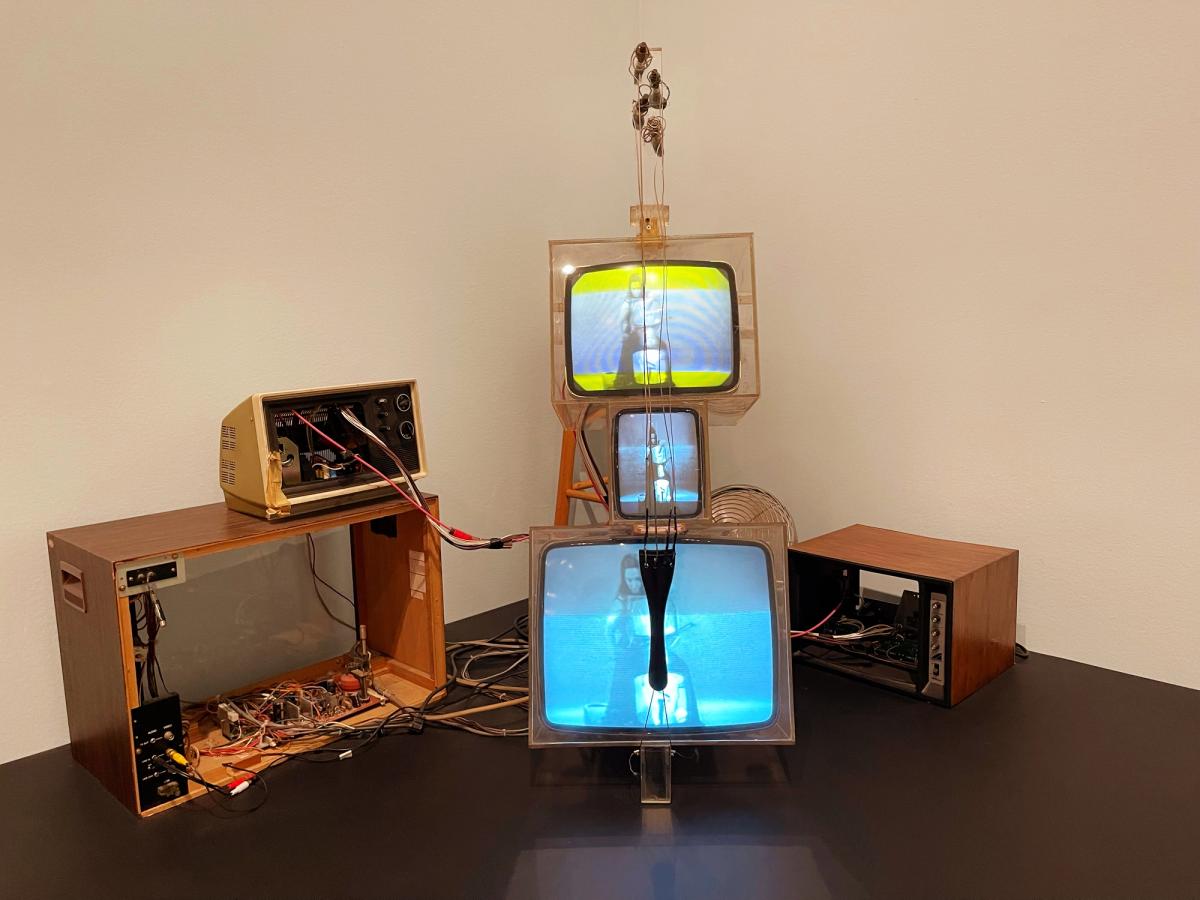 Nam June Paik's TV Cello (1966), stacked television monitors forming a cello-shaped instrument on exhibition
