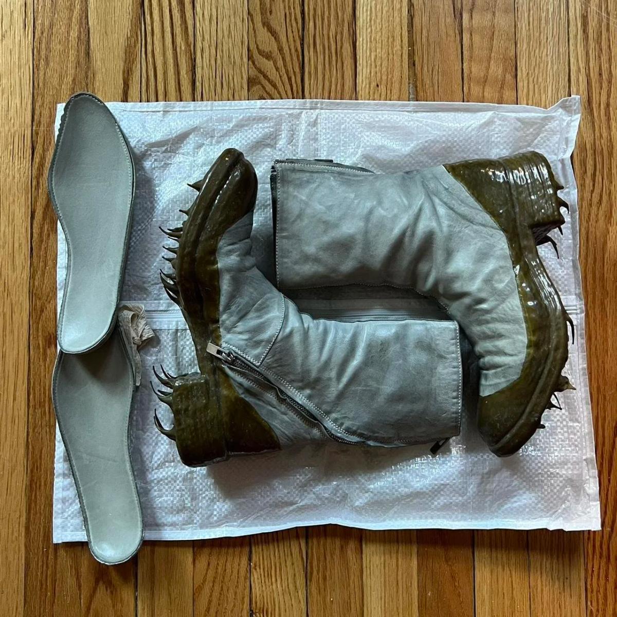  The Aesthetics of Earned Value: Carol Christian Poell Drip Boots; the rubber stalactites force the user to physically wear down the object's imperfection, transforming the initial discomfort into functional footwear and embodying a philosophical resistance to instant gratification. 