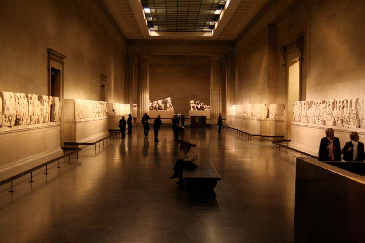 Sculptures from the Parthenon frieze mounted along a gallery wall in the British Museum.