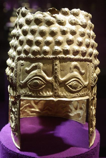The Golden Helmet of Cotofenesti, a Dacian gold helmet with large embossed eyes on the brow.