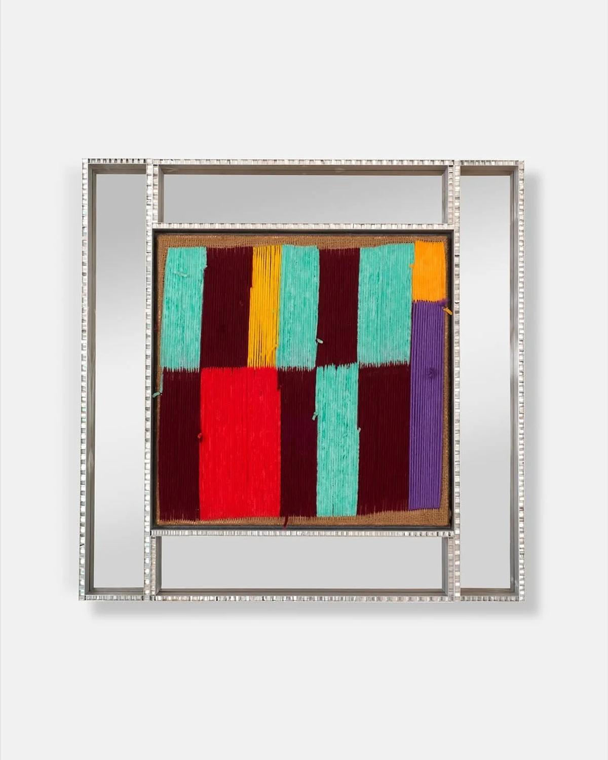 Alvaro Barrington,  Composition Feb S2  (MASSIMODECARLO): Tactile intimacy meets industrial architecture, where inherited yarn traditions are suspended within the unforgiving geometry of an engineered steel frame. 