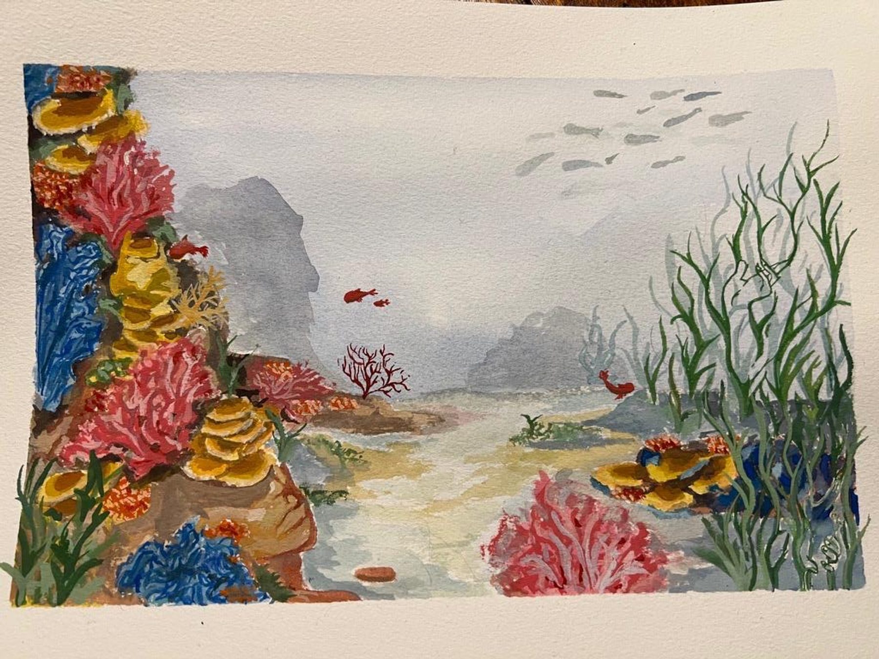 A watercolor reef scene with coral-like pink and yellow forms, grey fish silhouettes, and long green underwater plants.