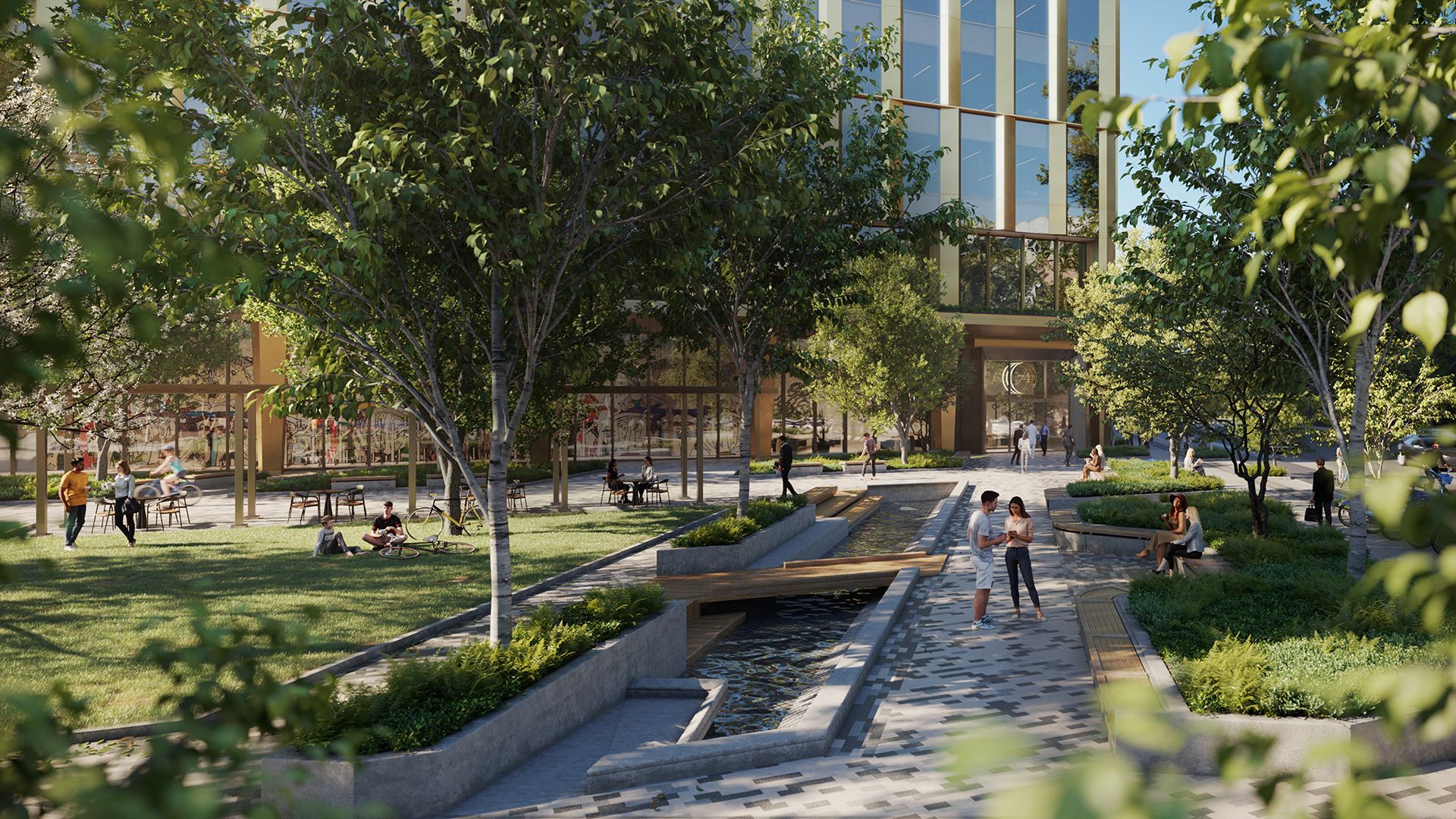 Park with lush greenery, a central plaza and a signature water fountain