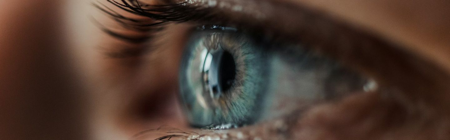Close-up, side-view of a blue eye | EMDR therapy | Tempo Therapy and Consulting