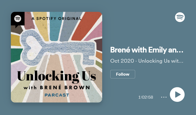 multicoloured logo of 'Unlocking us with Brene Brown' sits on a grey blue rectangle | burnout podcasts | Tempo therapy and consulting