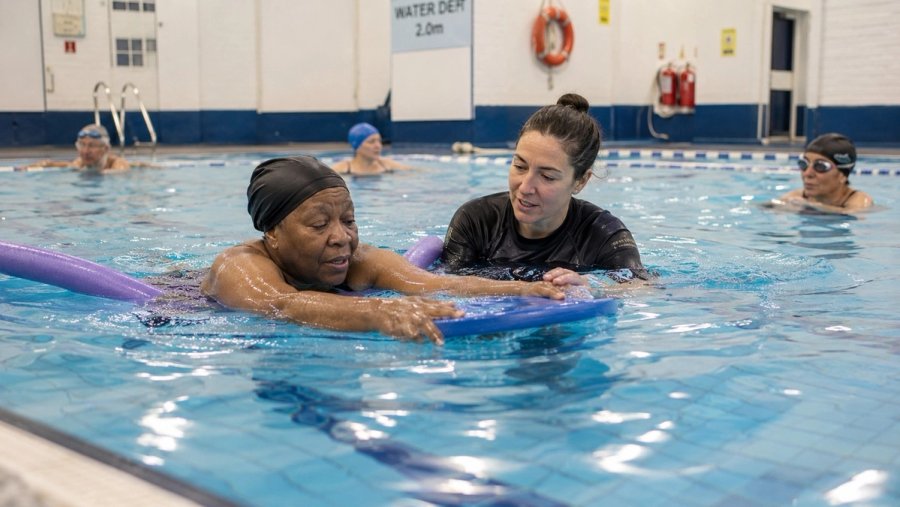 Adult swimmers in a coached session