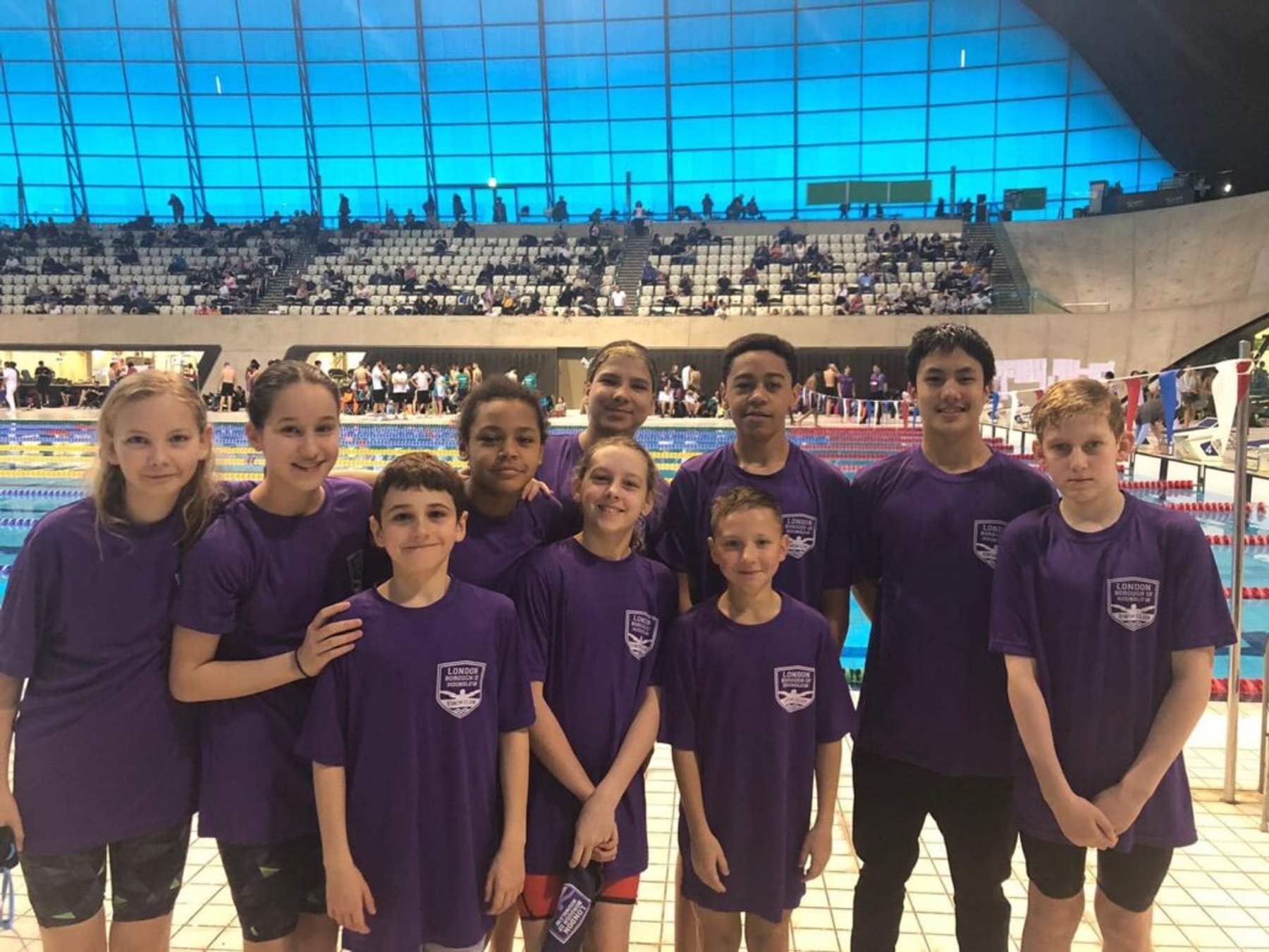 The LBHSC team in club t-shirts at the London Aquatics Centre
