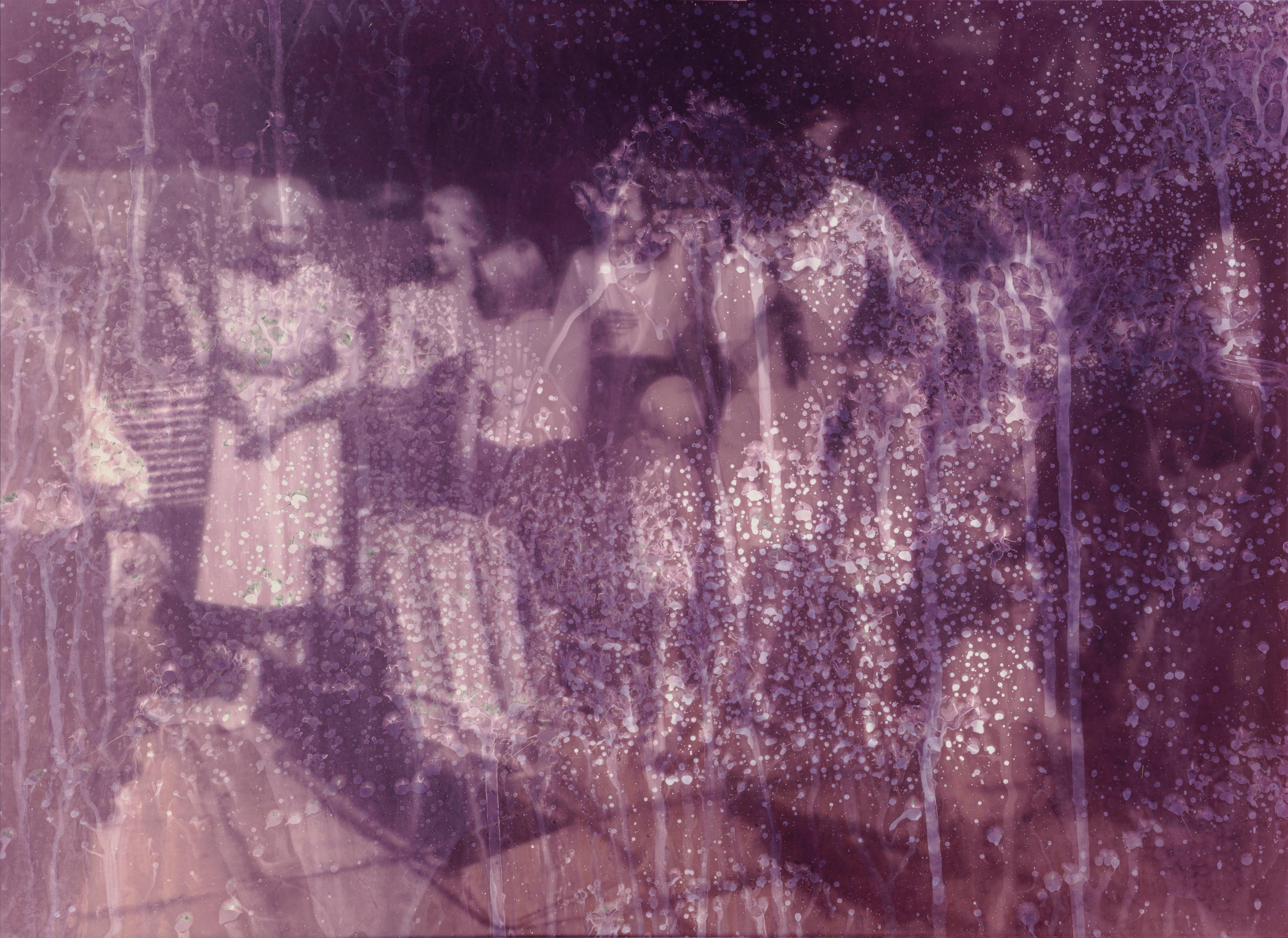 Analog image, purple filter over, a group of people standing together