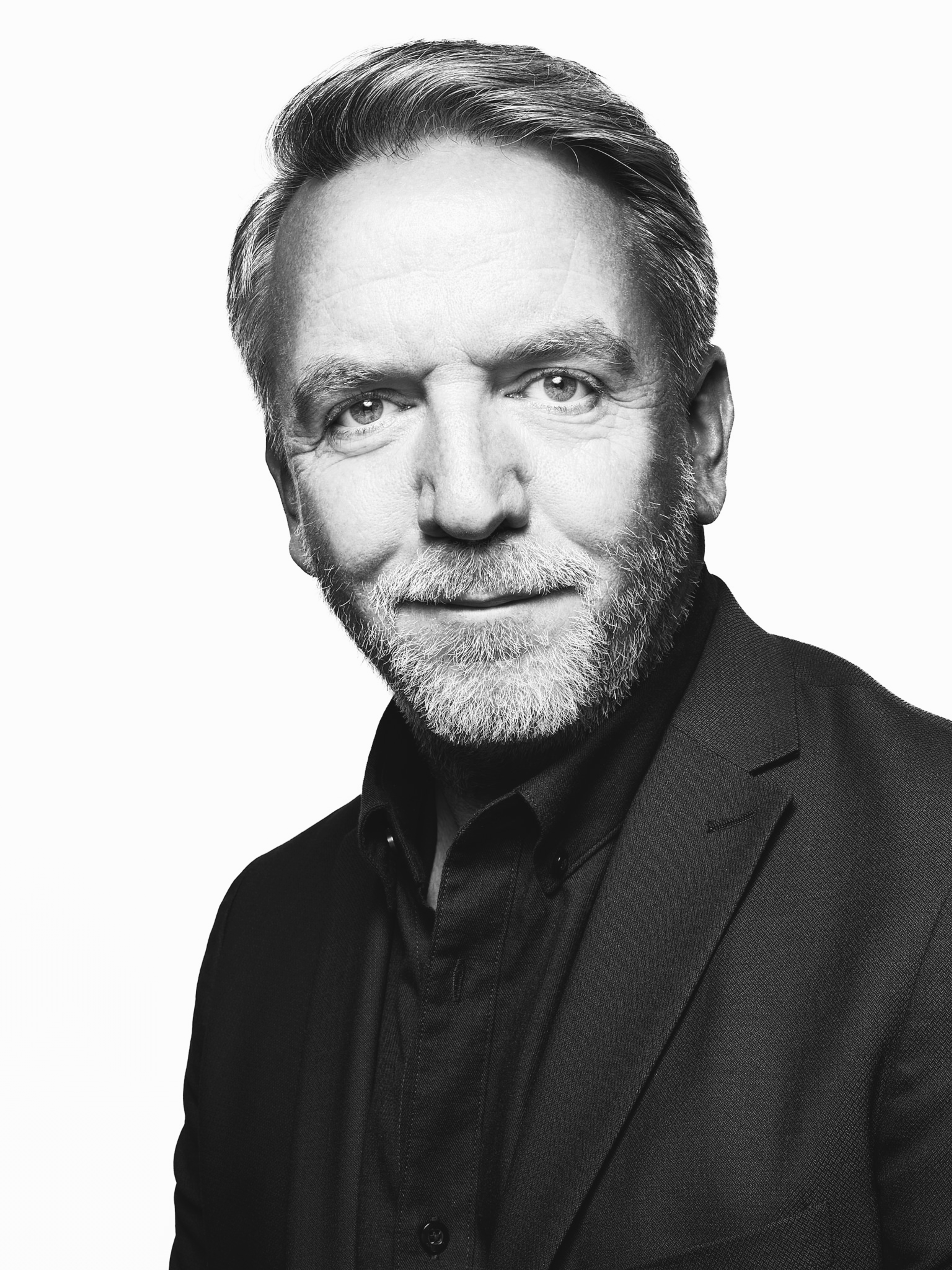 Black and white portrait of Matt Newton-Lewis, Fotografiska Global Vice President Technology.