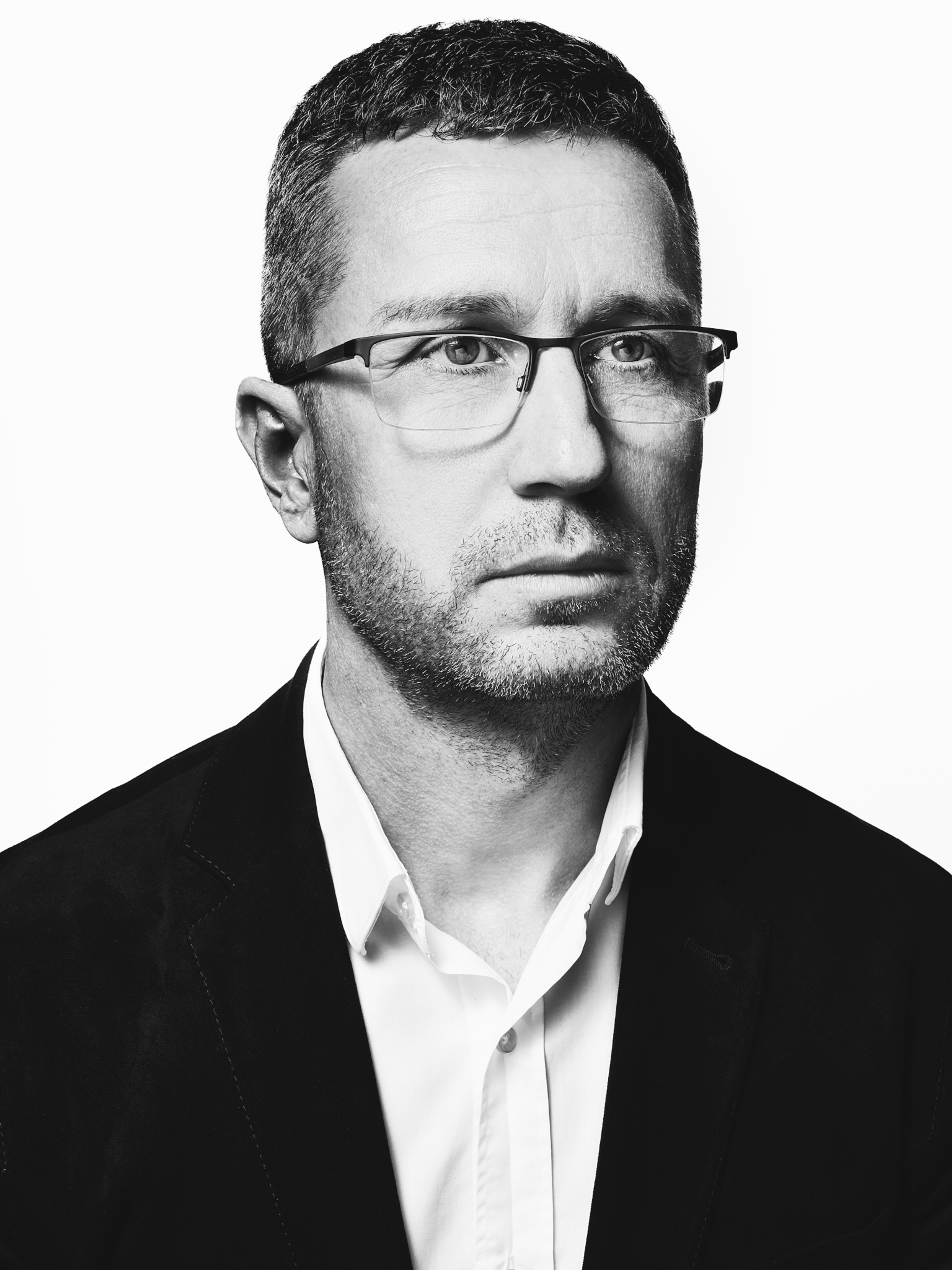 Black and white portrait of Enrico Maschek, Fotografiska Berlin Managing Director.