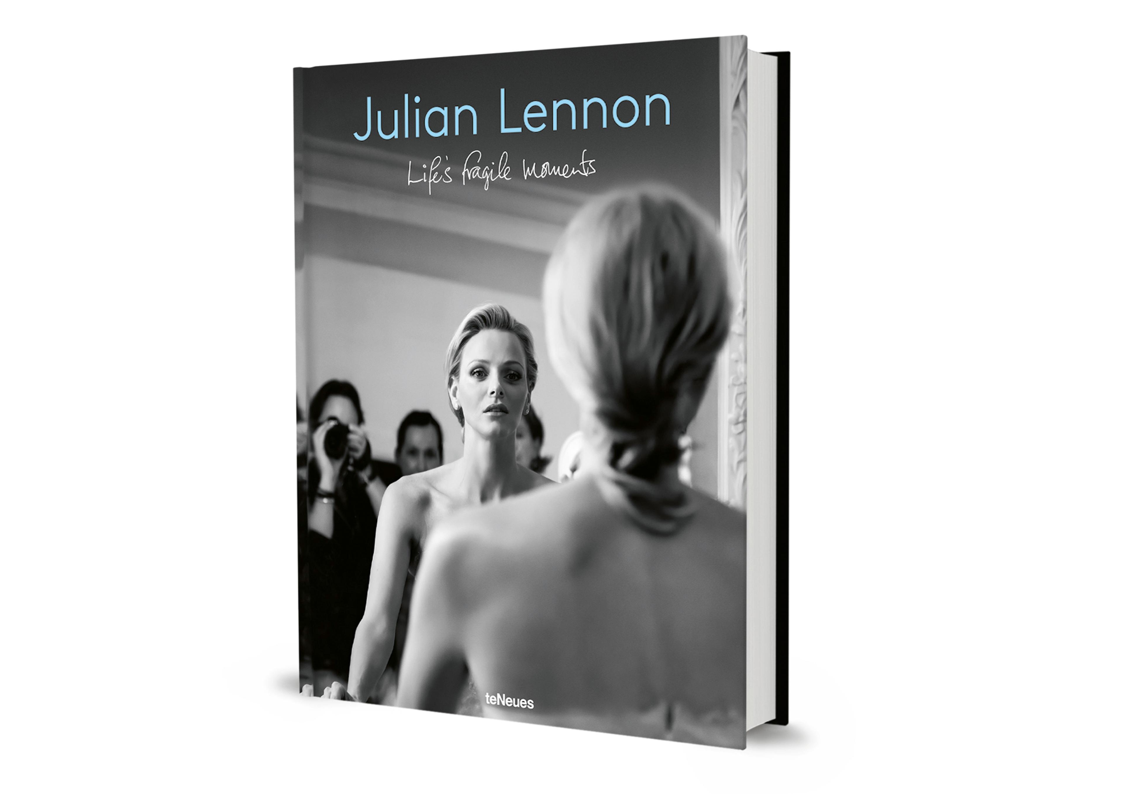 Cover of Julian Lennon's book "Life's Fragile Moments". A photo of a woman being photographed.