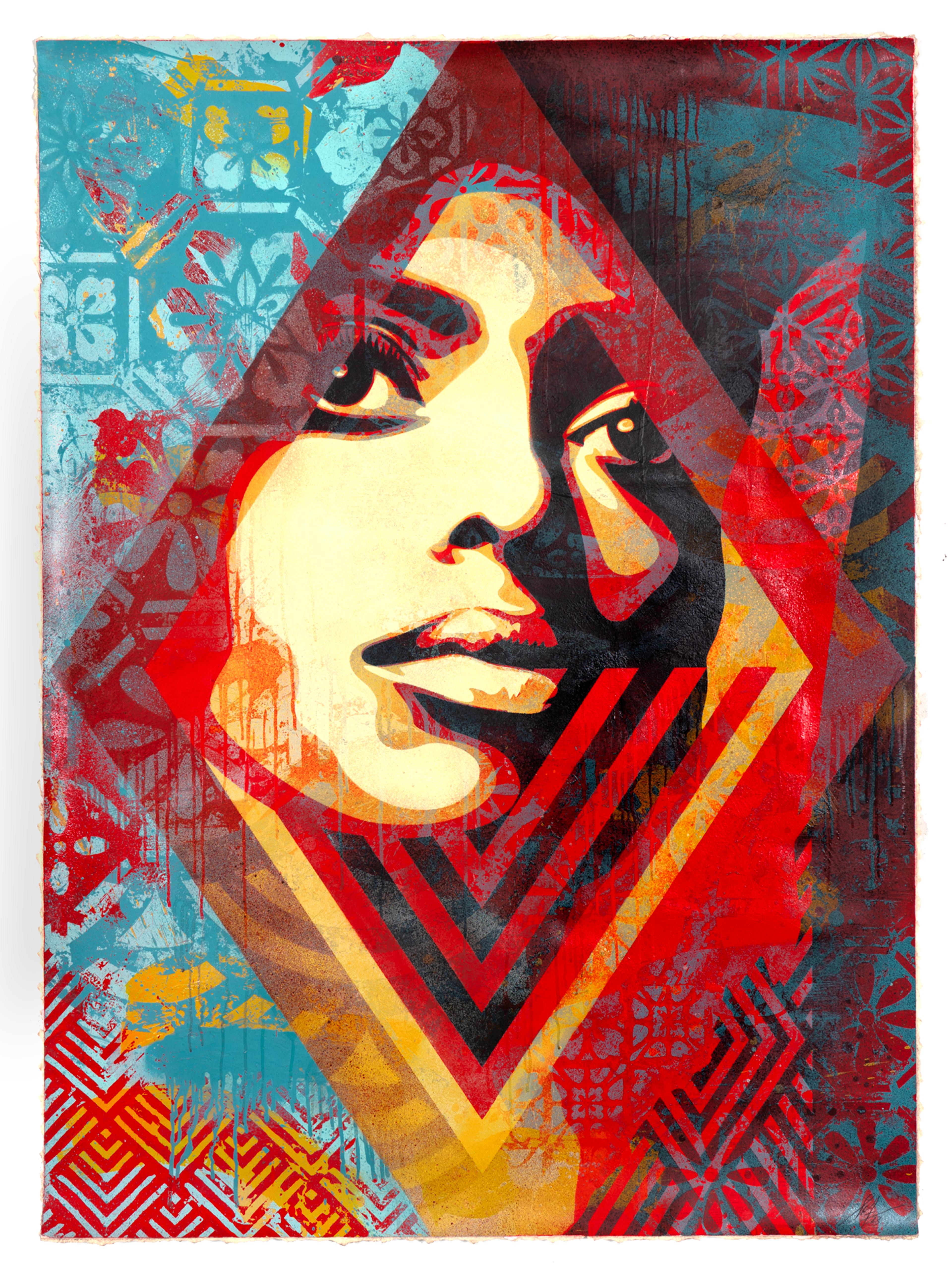 Face of a women coming through a diamond shape mainly in beige, red, blue and black colors
