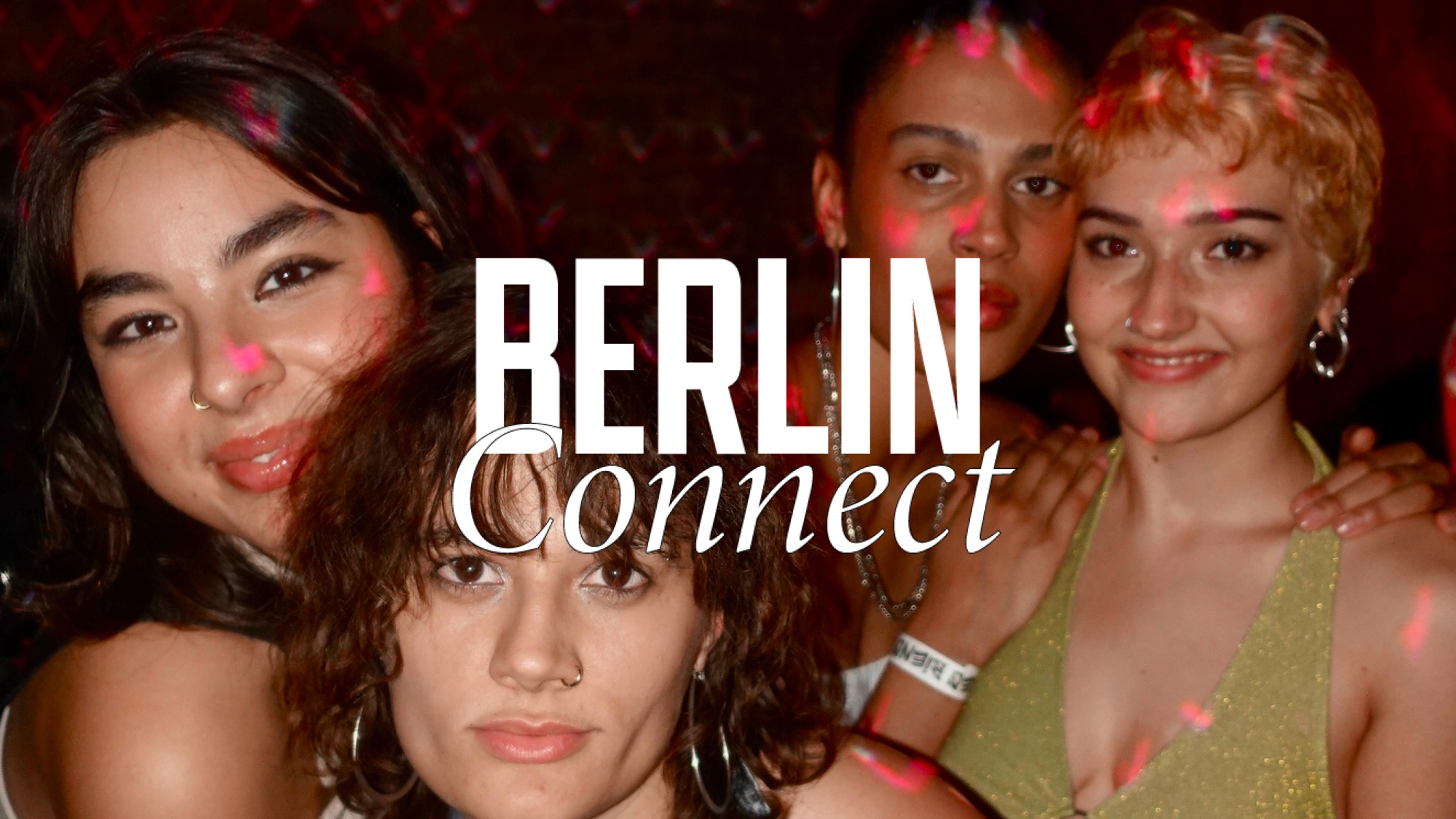 Photograph of four women in party atmosphere 