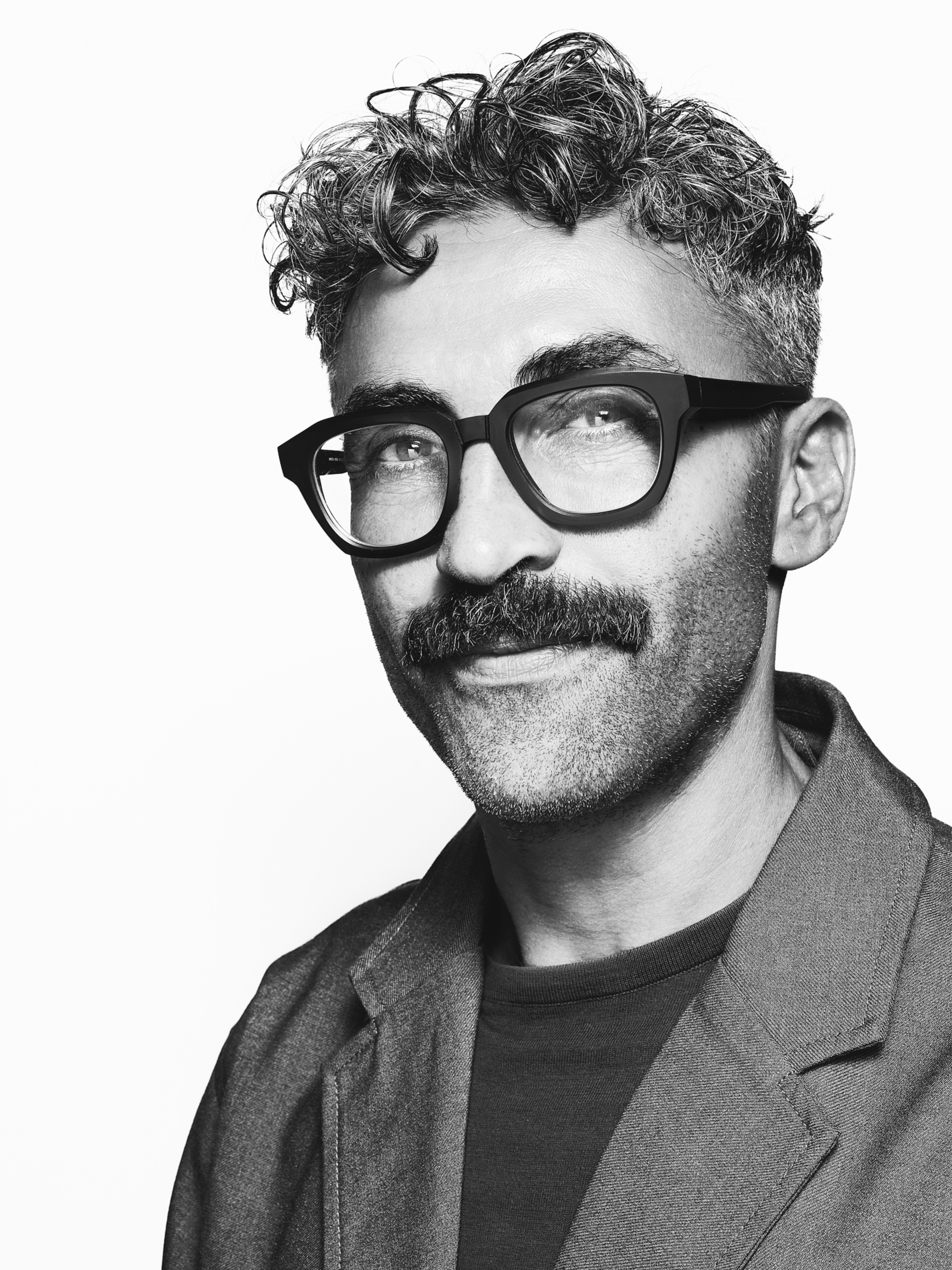 Black and white portrait of Yousef Hammoudah, Fotografiska Global Vice President Community and Brand Development