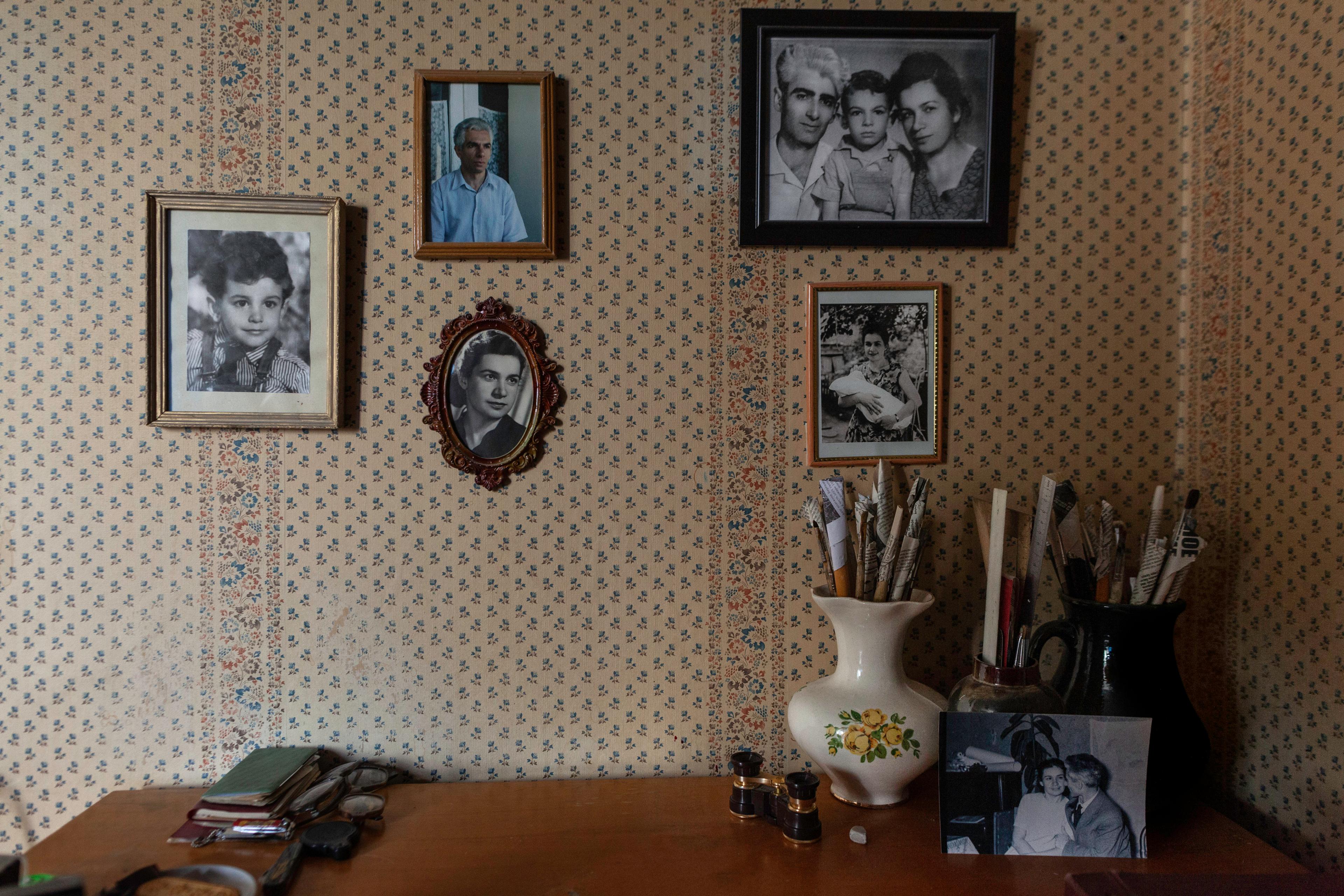 wall of an apartment decorated with family photos