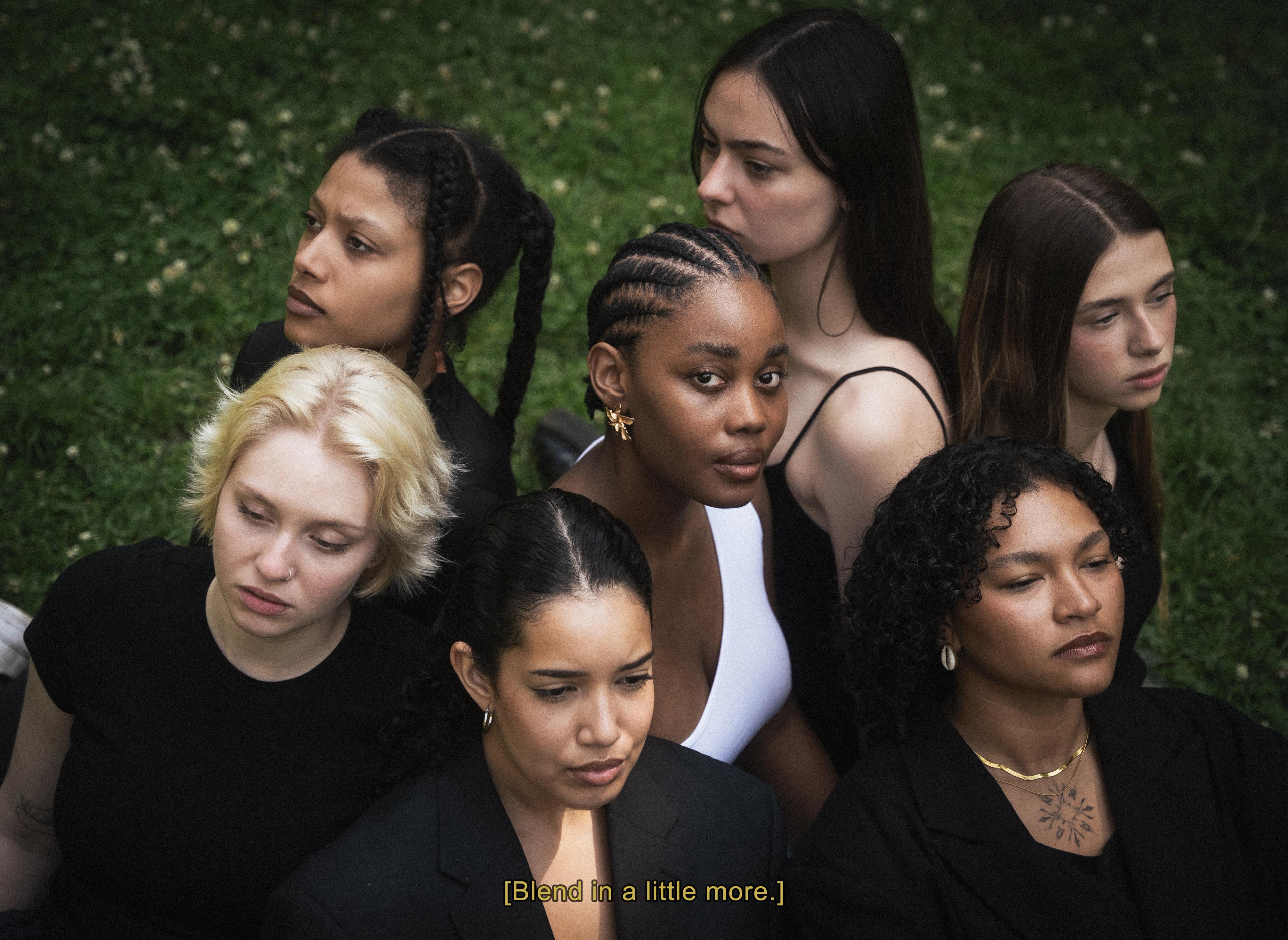 Seven women standing on grass, Subtitle [Blend in a little more]