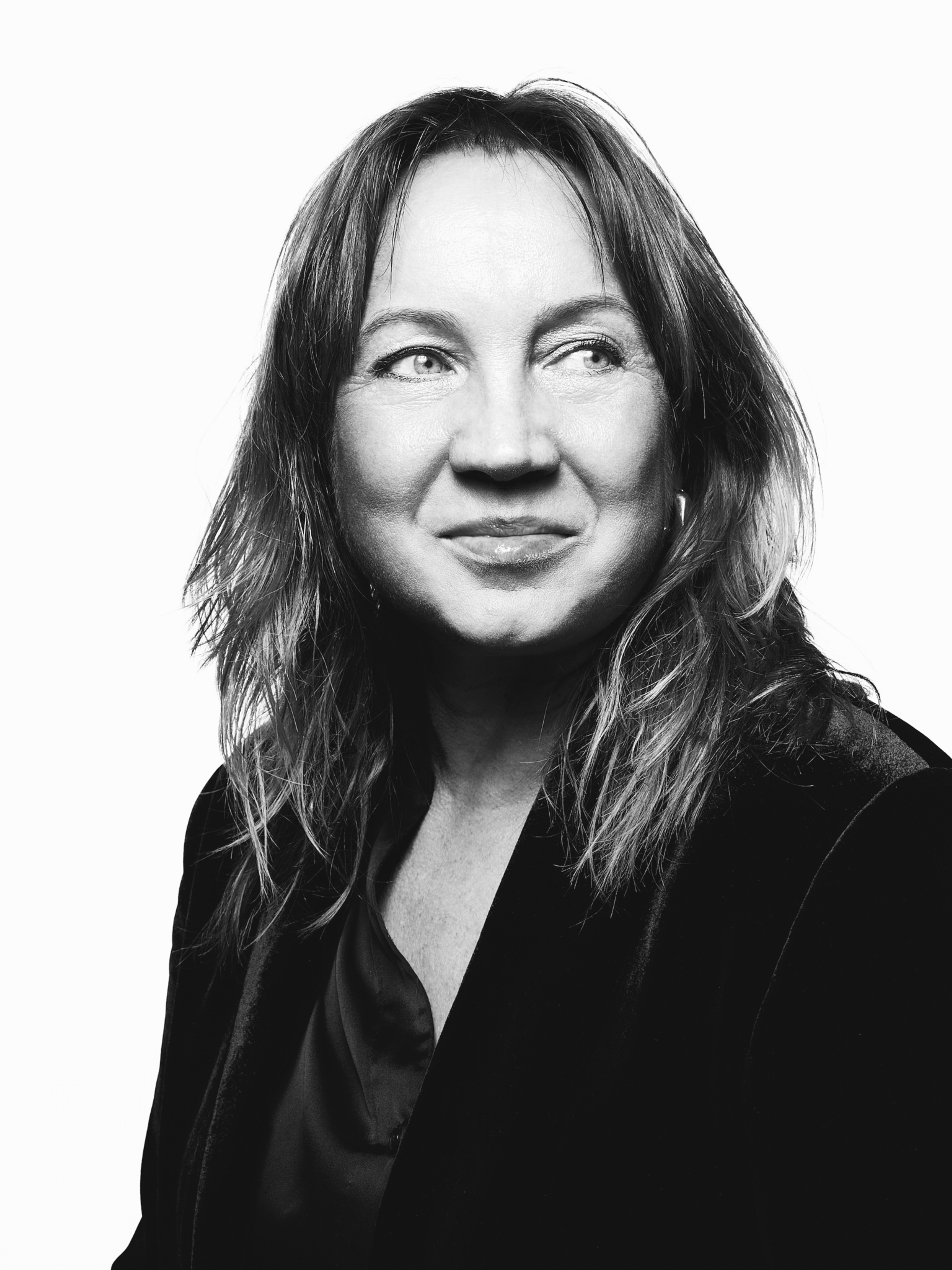 Black and white portrait of Margit Aasmäe, Fotografiska Tallinn Executive Director.