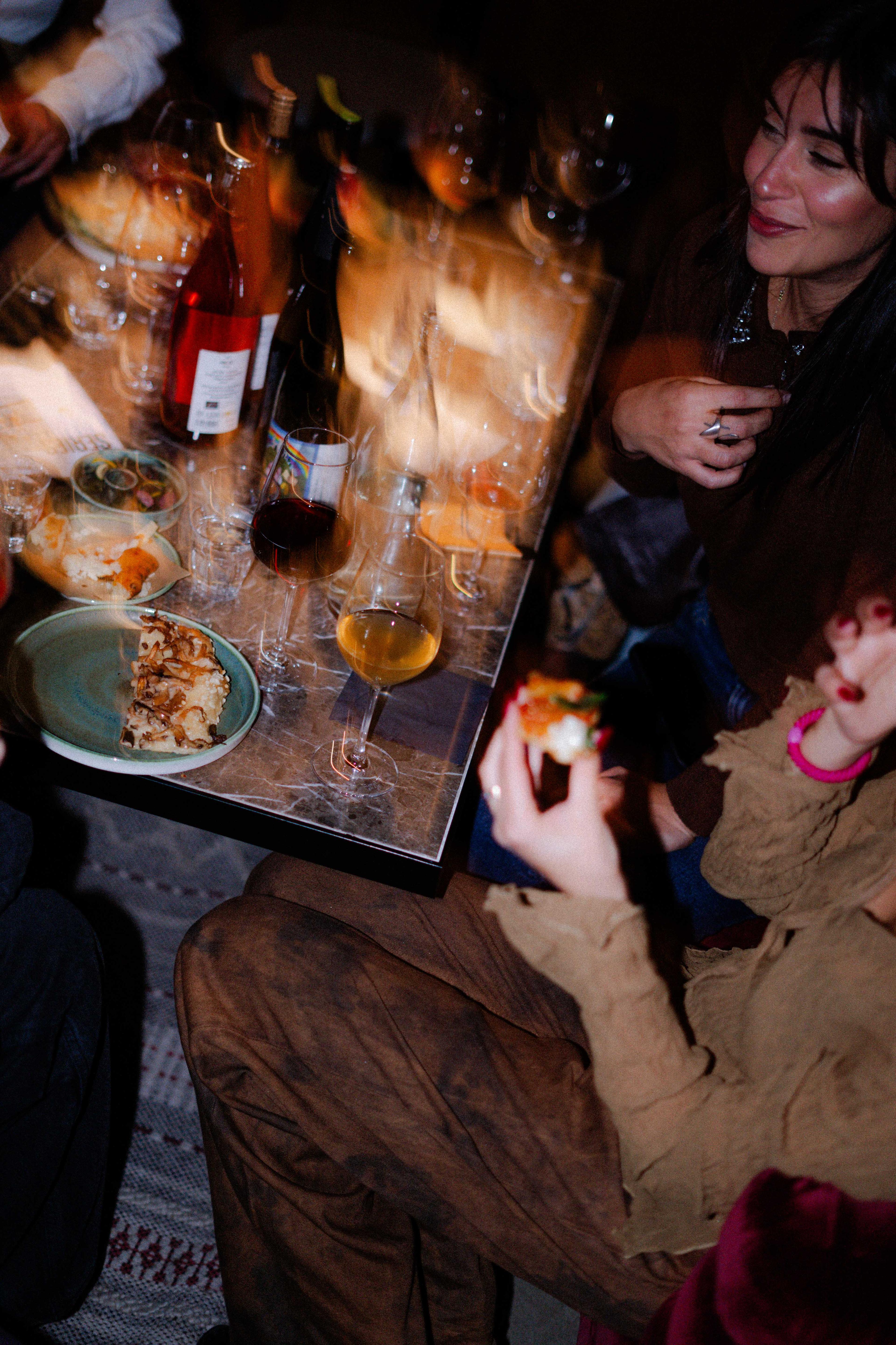 Wine glass and plate on table