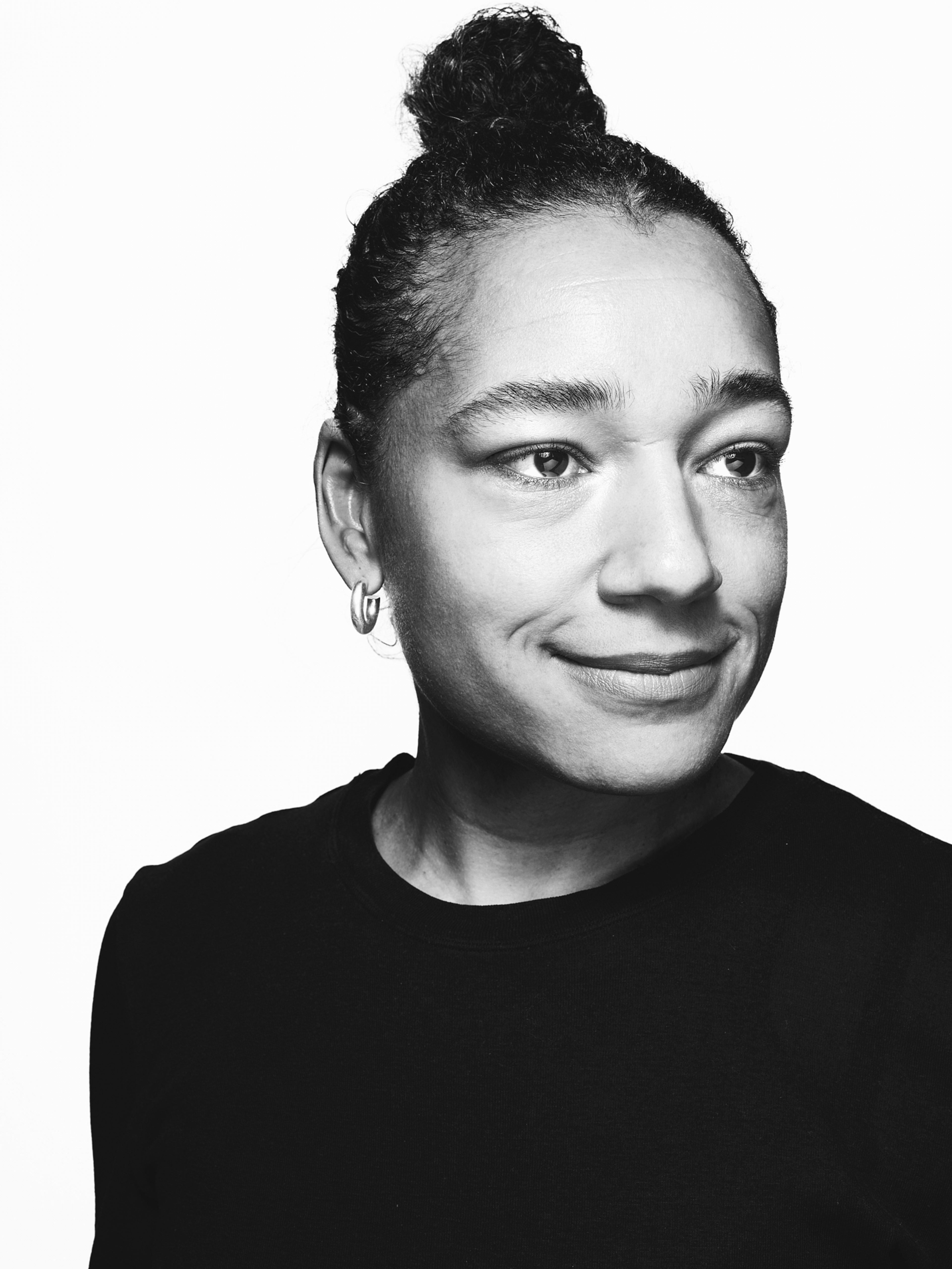 Black and white portrait of Abiola Muritala, Fotografiska Global Director Brand and Marketing