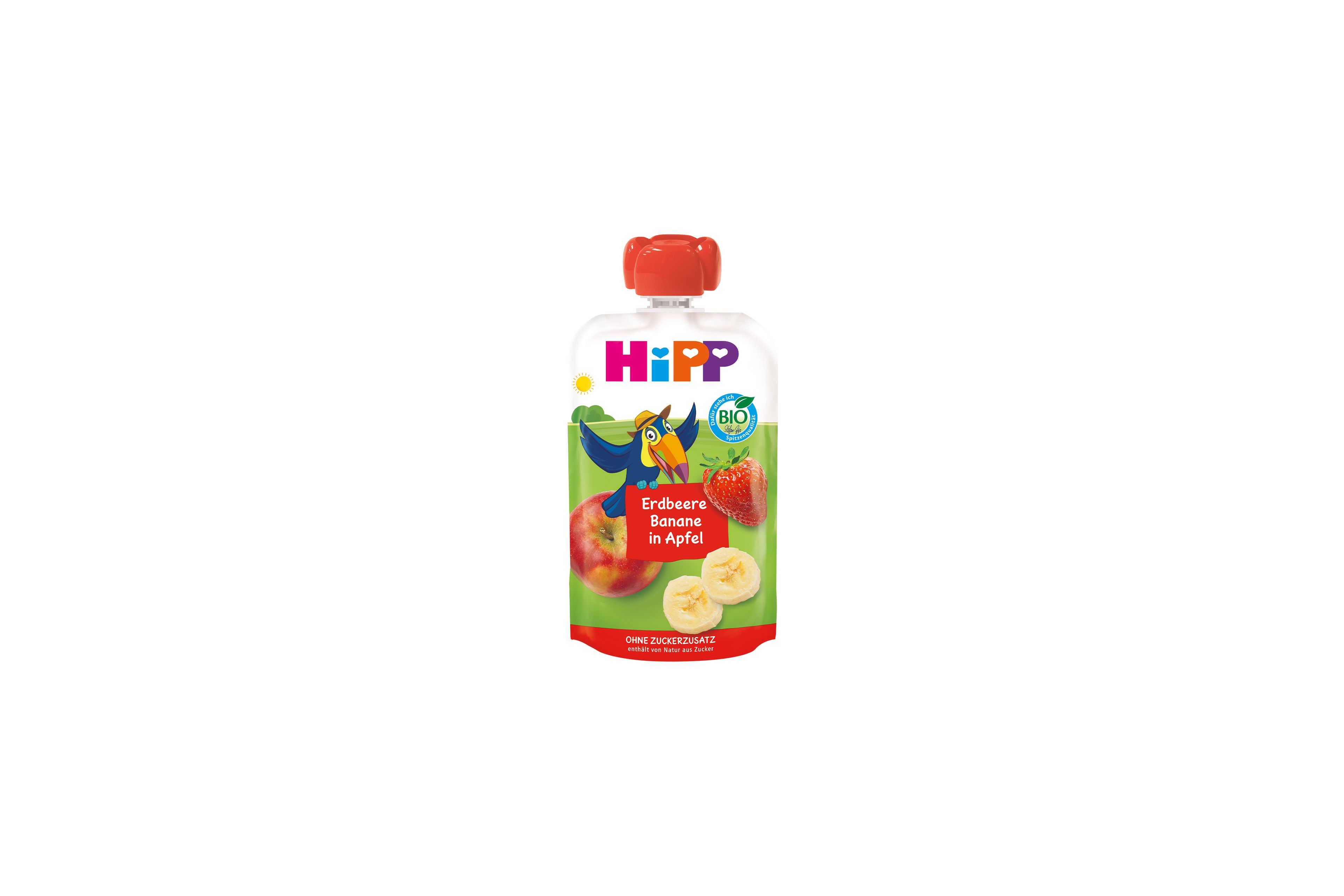 HiPP Bio-Quetschbeutel „Erdbeere Banane in Apfel“ mit Apfel-, Erdbeer- und Bananenmotiv sowie Tukan-Illustration auf der Vorderseite