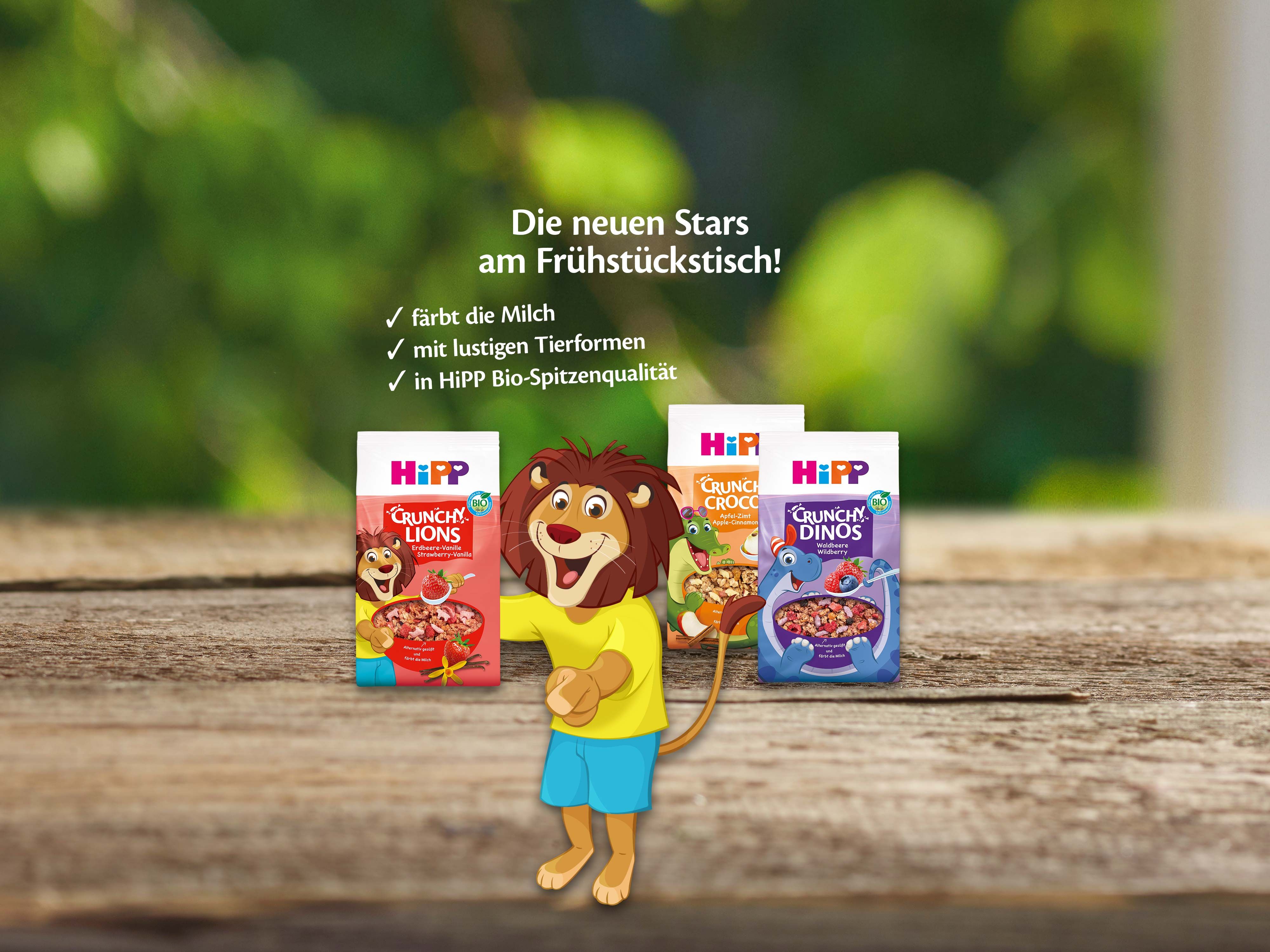 Drei HiPP Frühstückscerealien-Packungen mit Tierfiguren auf der Vorderseite und Text zu Bio-Qualität und lustigen Tierformen