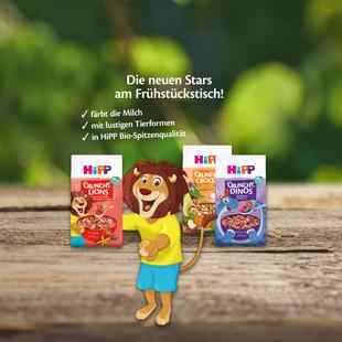 Drei HiPP Frühstückscerealien-Packungen mit Tierfiguren auf der Vorderseite und Text zu Bio-Qualität und lustigen Tierformen