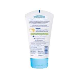 Rückseite einer weißen Tube mit blauem Verschluss und Textinformationen zu einem hypoallergenen Ölbalsam mit 150 ml Inhalt