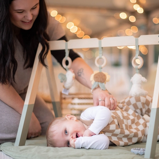 Mum playing with baby