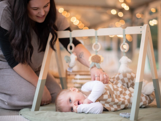 Mum playing with baby