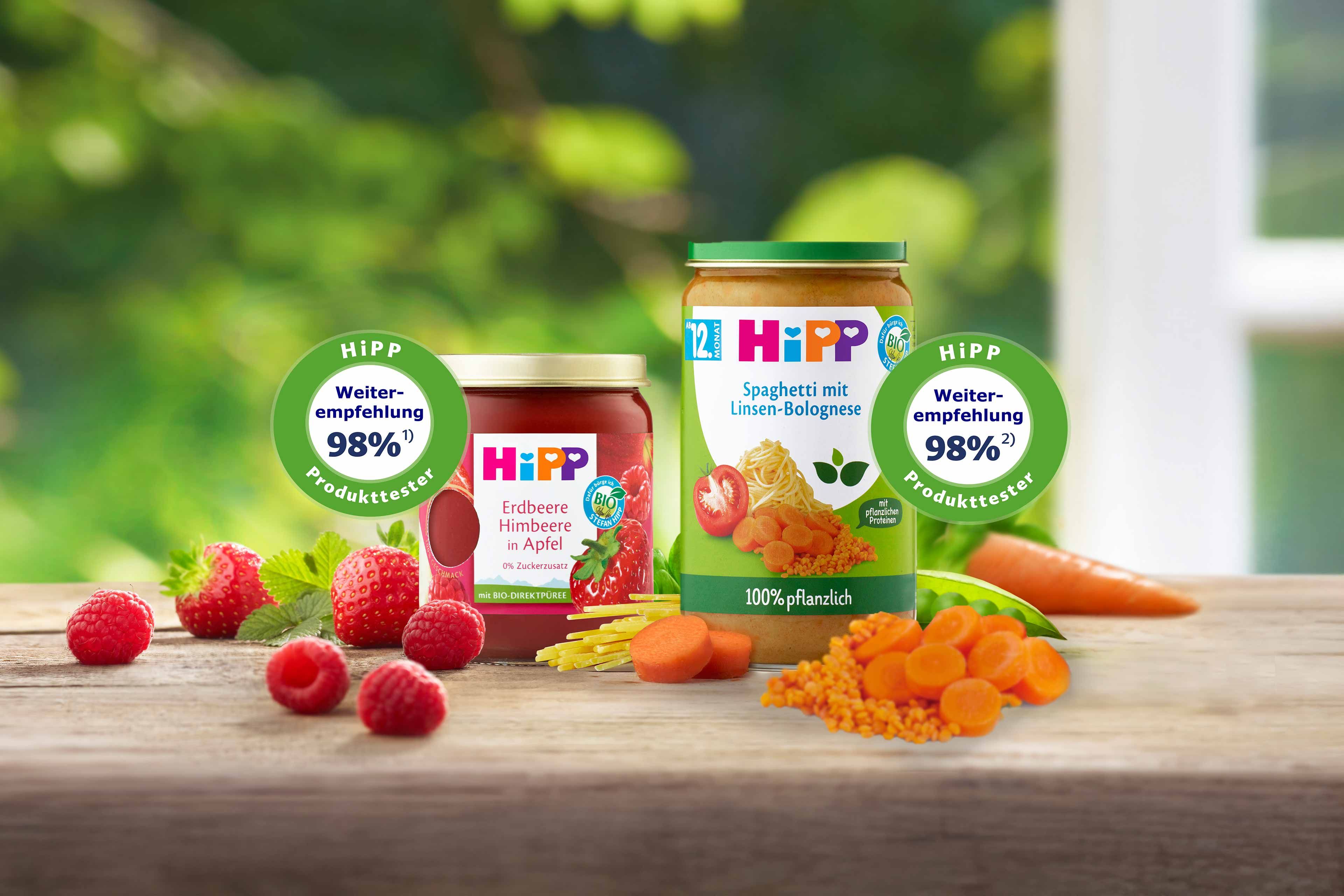 HiPP Premium Früchte und 100% pflanzliche Beikostgläschen mit Erdbeeren, Himbeeren, Linsen-Bolognese und 98 % Weiterempfehlungssiegel.