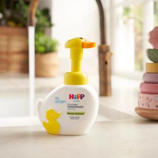 Handwash duck on a sink next to a tap