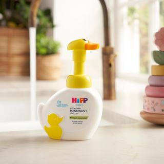 Handwash duck on a sink next to a tap
