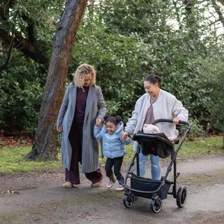 Mum and Grandma walking with toddler and buggy