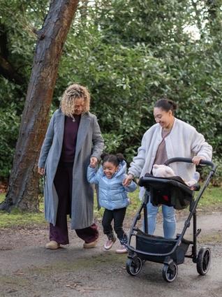 Mum and Grandma walking with toddler and buggy